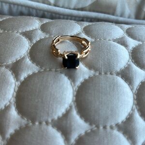 Black and gold ring